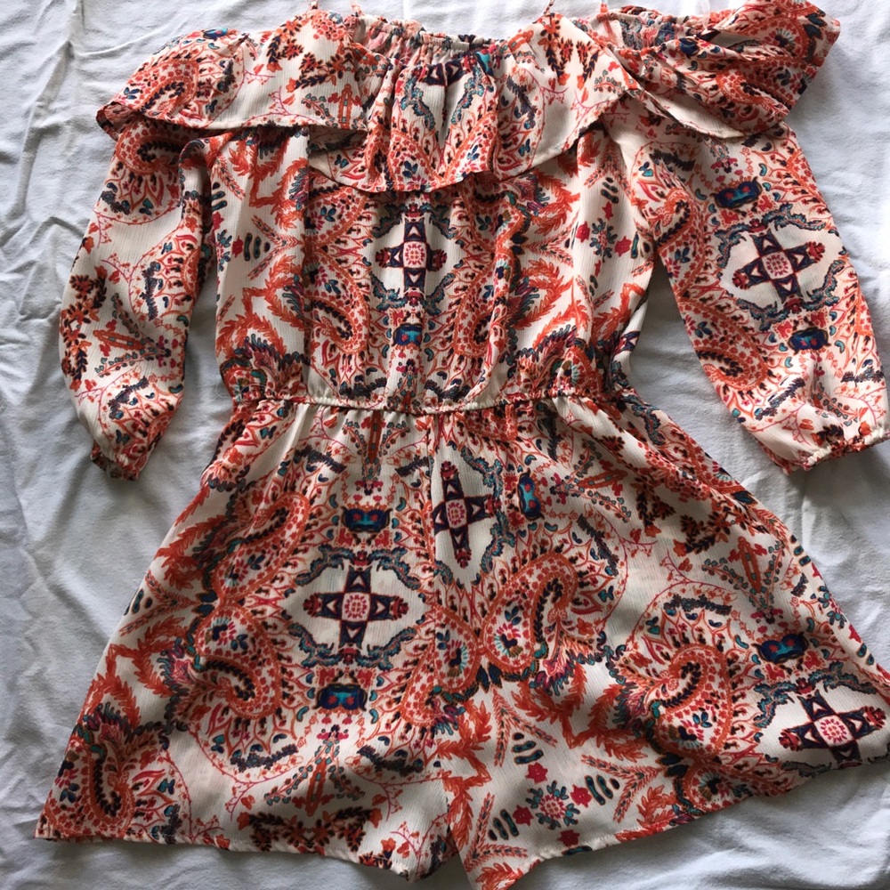 Ruffle tribal off the shoulder long sleeve romper